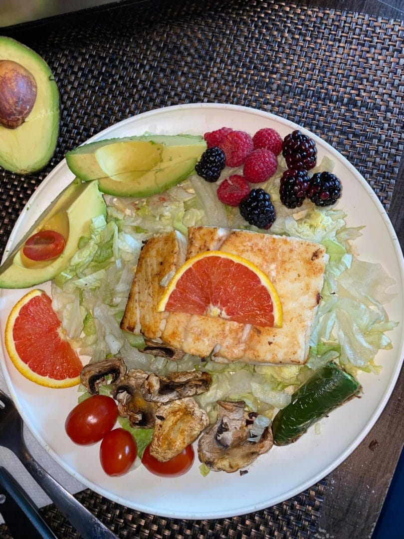 fish with fruit and salad